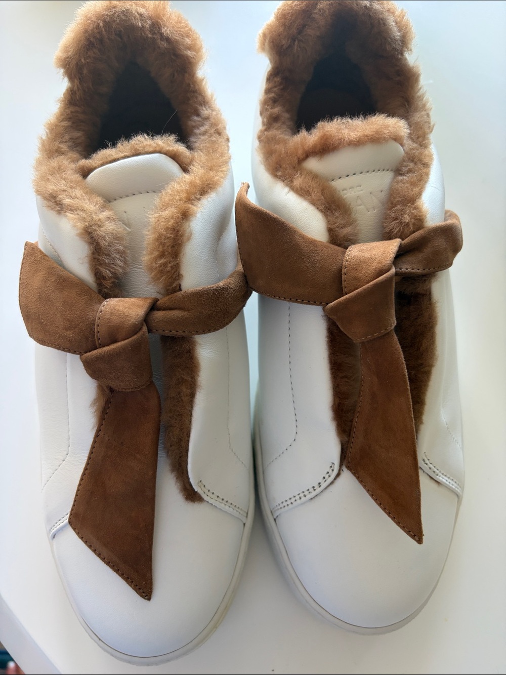 Alexander Birman White Leather Slip-On Sneakers with Brown Suede Bow & Fur Trim